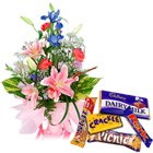 Seasonal Flowers Arrangement with Assorted Cadburys Chocolate Seasonal Flowers Arrangement with Assorted Cadburys Chocolate