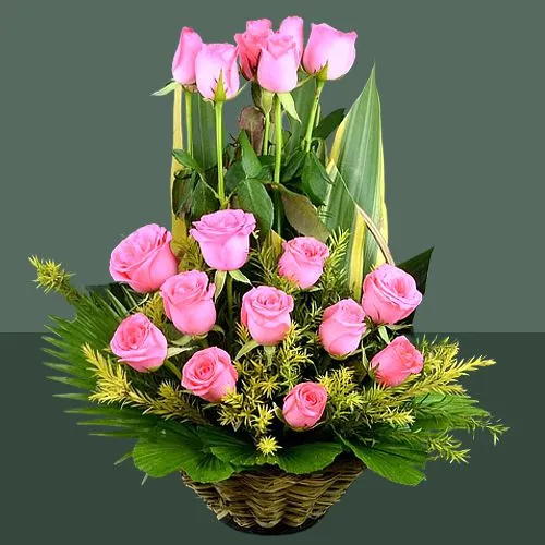 Designer Display of Pink Roses in a Basket	
