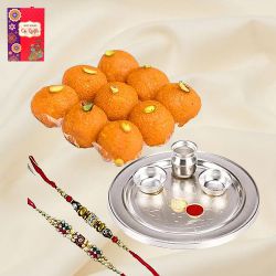 Pride-to-Possess Silver Plated Designer Tray with <font color=#FF0000>Haldiram</font> Ghee Ladoo & 2 Designer Rakhi and Roli Tilak Chawal Pride-to-Possess Silver Plated Designer Tray with <font color=#FF0000>Haldiram</font> Ghee Ladoo & 2 Designer Rakhi and Roli Tilak Chawal