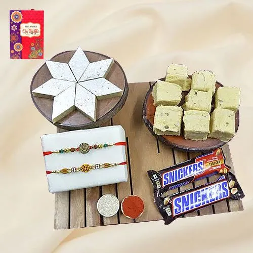 Divine Swastik Rakhi with Haldiram Sweets N Imported Snickers