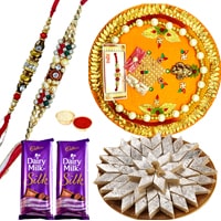 Wonderful Pooja Thali, Yummy Kaju Katli, Gift Voucher from Pantaloons with 2 free Rakhi, Roli Tilak and Chawal Wonderful Pooja Thali, Yummy Kaju Katli, Gift Voucher from Pantaloons with 2 free Rakhi, Roli Tilak and Chawal
